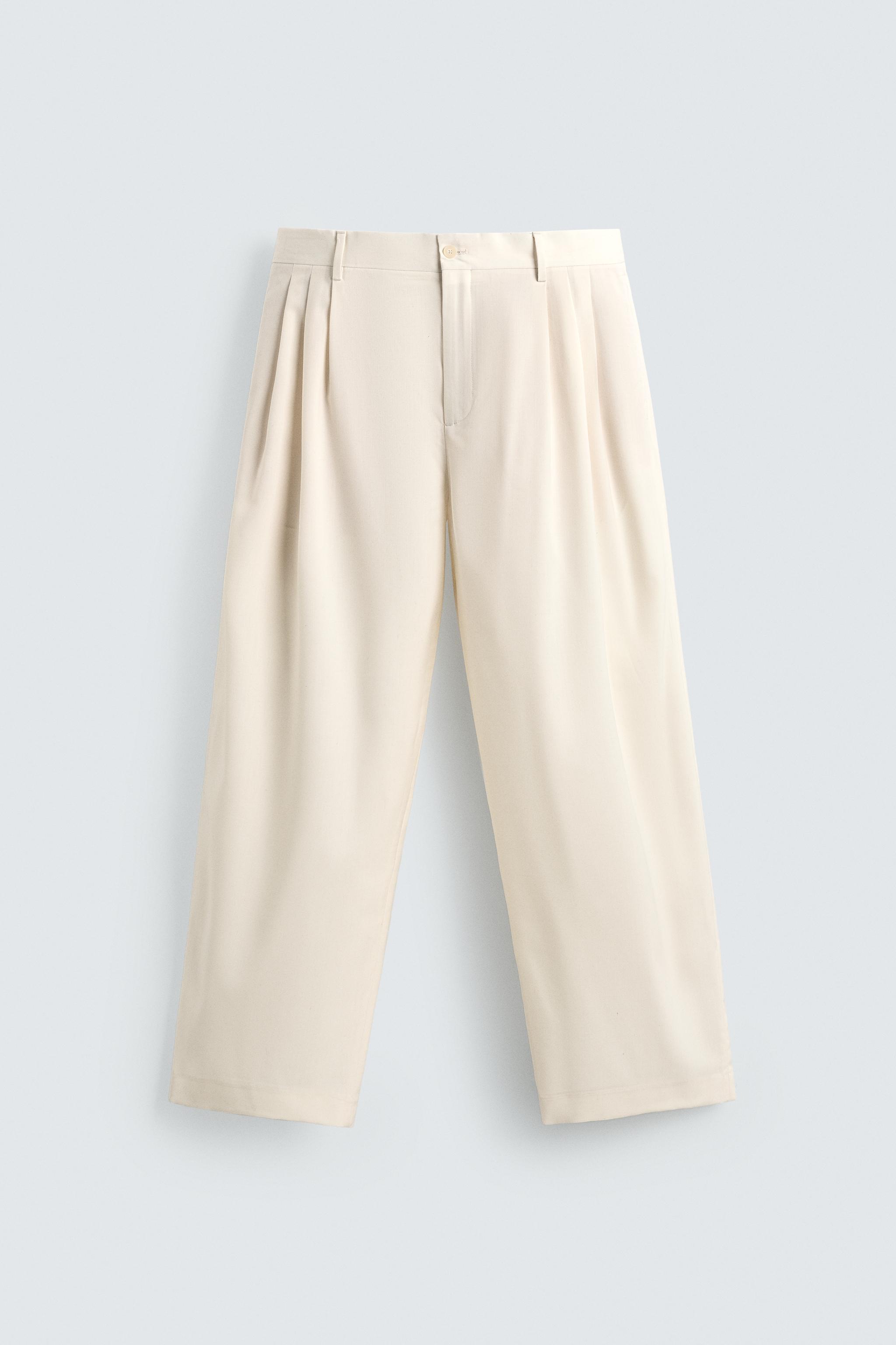 WOOL PLEATED PANTS